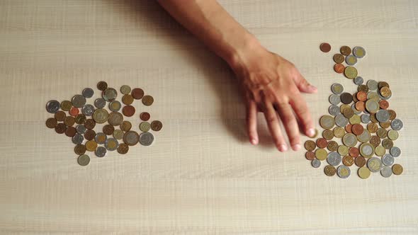 man sits at table at home and recalculates coins. financial crisis and poverty