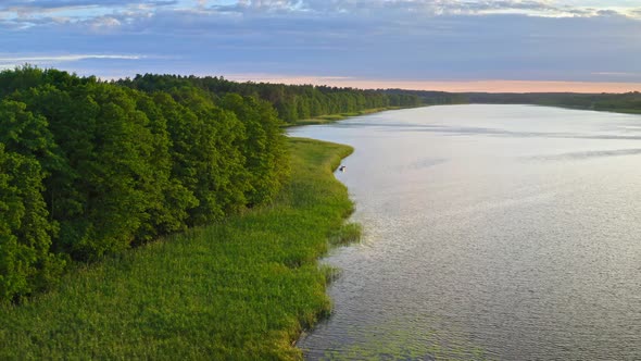 Aerial view of lake in summer at sunset