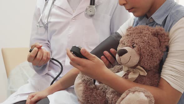 A Shows How a Doctor Measures the Pressure of a Little Girl