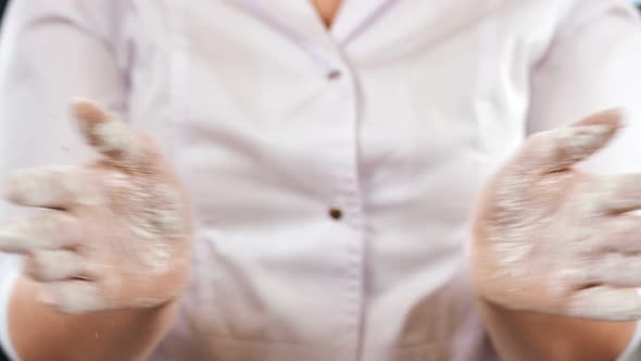 Closeup Confectioner Claps Hand Surrounded By Powder Slow Motion