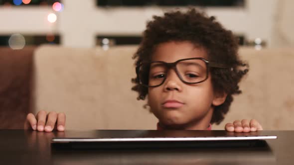 Kid Appears at Computer Desk.