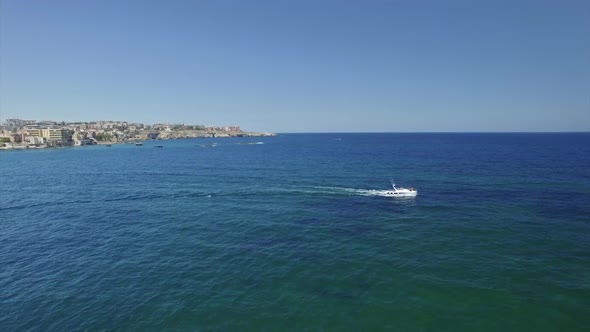 Boat Floating In The Sea