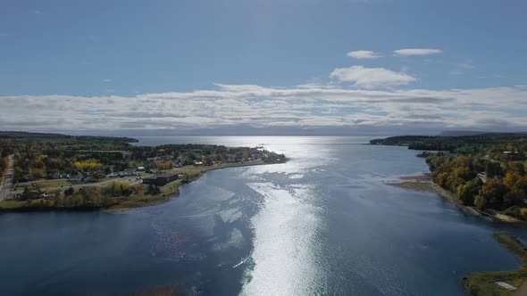 Drone rises above the harbour of Parrsboro, Nova Scotia, Canada