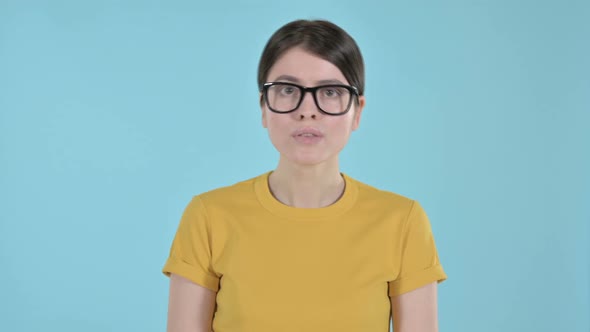 Young Woman Feeling Shocked and Annoyed on Purple Background