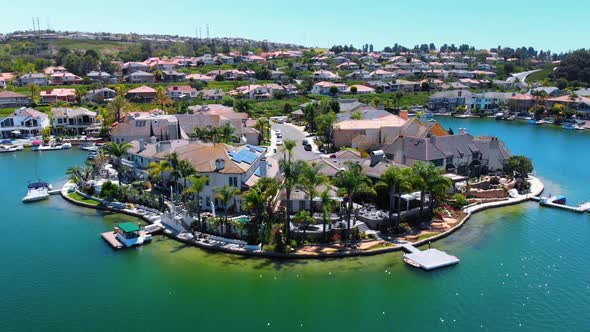 Aerial fly by of luxury houses on community lake mission viejo camera 2