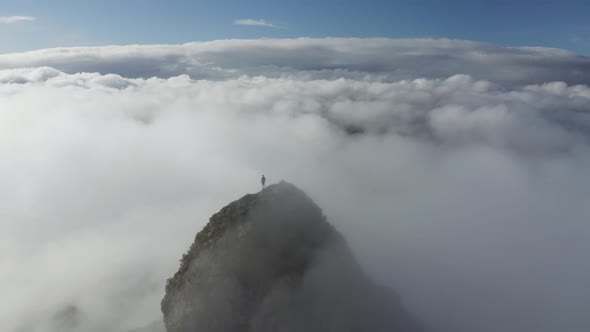 Aerial view of a person standing on Le Pouce Mountain, Mauritius.