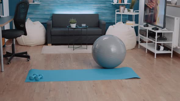 Nobody in Living Room with Sport Equipment to Exercise