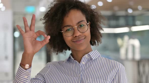 Appreciative African Businesswoman Showing OK Sign By Hand