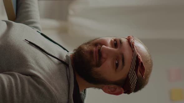 Vertical Video Portrait of Happy Man Looking at Camera Smiling