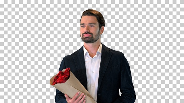 A young man in a suit holding a bouquet, Alpha Channel