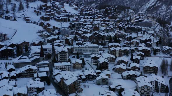 Jib up of beautiful snow covered town