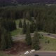Flying Over The Road Through The Fir Forest In The Mountains - VideoHive Item for Sale