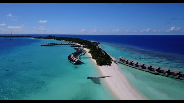 Aerial view tourism of beautiful coastline beach trip by blue sea with white sandy background of a d