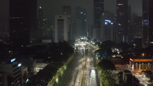 Aerial Dolly Forward Flying Shot of Almost Empty Multi Lane Highway at Night During Covid 19