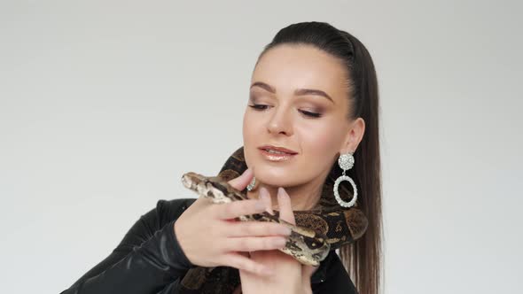 Snake's Head on a Woman's Hands