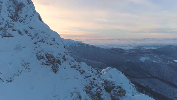 Snowy and Rocky Mountain Wall