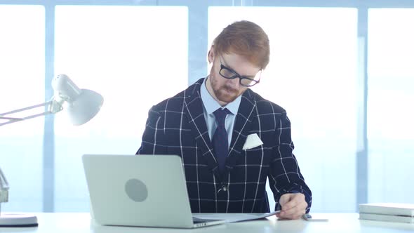 Redhead Businessman Writing in Office, Documentation