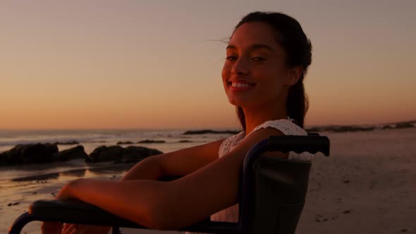 Young woman by the sea