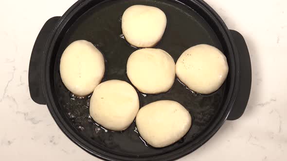 Fry Dough With Hot And Bubbly Oil