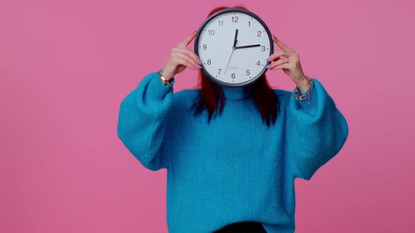Young Woman Holding Clock Watch Hiding Checking Time on Clock Running Late to Work Being in Delay