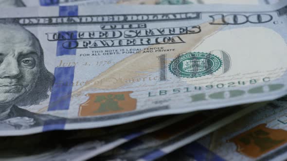 Rotating stock footage shot of $100 bills - MONEY 0129