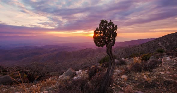 Dramatic Sunset time lapse over desert valley