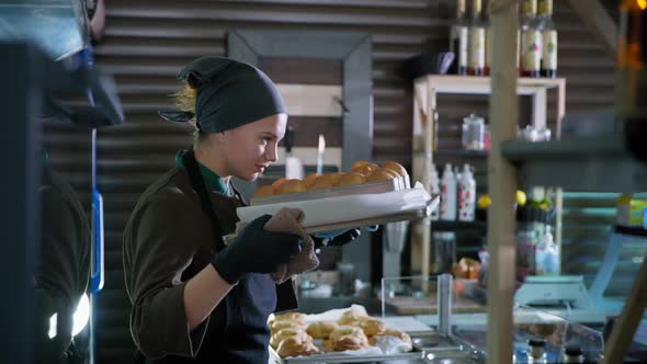 Small Business, Woman Pastry Chef Holding Fresh Fragrant Buns in Hands Taken Out of Oven, Female