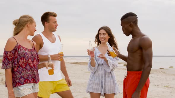 Friends with Non Alcoholic Drinks on Beach 