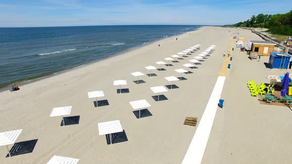 Aerial view of the beach umbrellas in summer