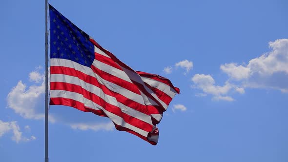 The flag of the United States of American blowing in the wind