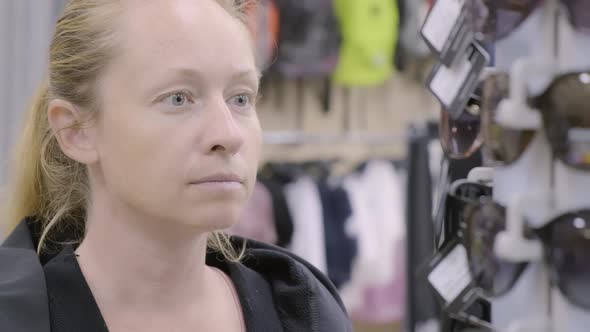 Woman shopping in shop. 