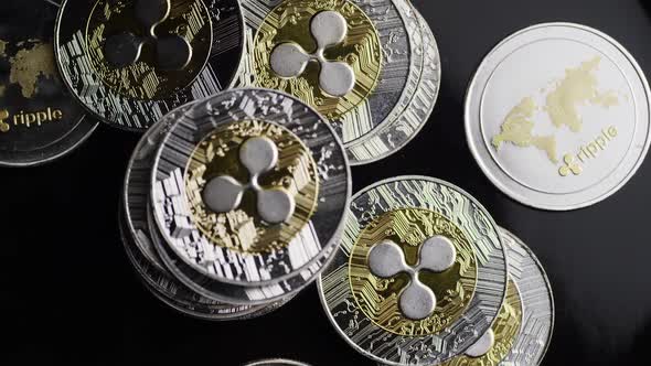 Rotating shot of Bitcoins (digital cryptocurrency) - Ripple