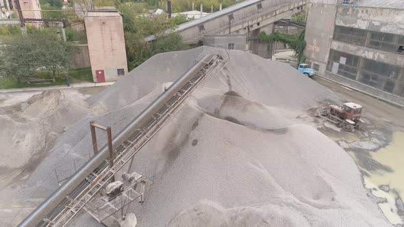 Aerial shot of conveyor belts and sand heaps