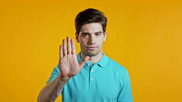 Man Disapproving with NO Hand Sign Gesture. Denying, Rejecting, Disagree, Portrait of Guy or Student