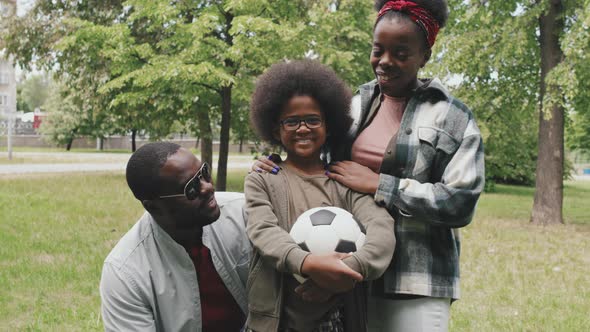 Portrait of African American Family with Football