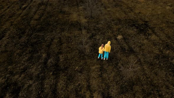 Ukrainian Girls in Clothes in the Colors of the Ukrainian Flag on the Ground