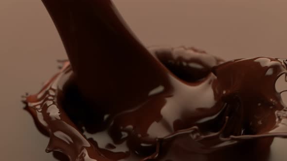 Super Slow Motion Detail Shot of Pouring Melted Chocolate at 1000 Fps