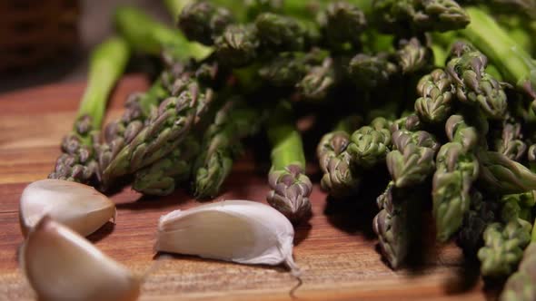 Close Up of Garlic and Spears of Peeled Asparagus