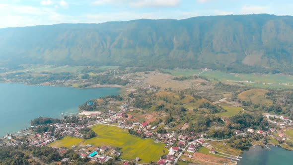 Aerial: lake Toba and Samosir Island view from above Sumatra Indonesia