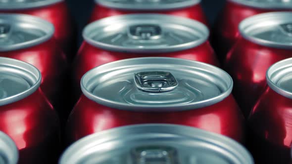 Passing Cans Of Drink In Factory