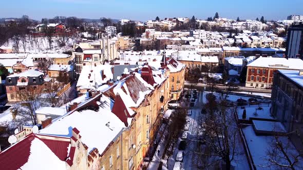 Aerial view of a drone flying over the building