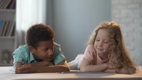 Children Watching Cognitive Show Hesitantly Looking at Each Other Embarrassing