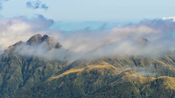 Misty Clouds Moving Fast over Beautiful Mountains Peak in New Zealand Wilderness Nature