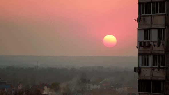 Timelapse Sunset In City With Countryside Silhouette. Sunset Behind Buildings In Kiev City Ukraine.