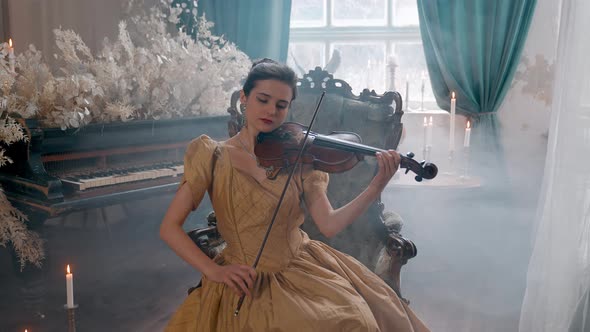 Girl Plays Violin On Chair