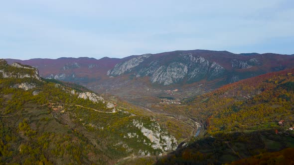 steep green mountains, deep forest and mountain road, beautiful valley and river