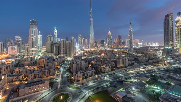 Dubai Downtown Skyline Night to Day Timelapse with Burj Khalifa and Other Towers Paniramic View From