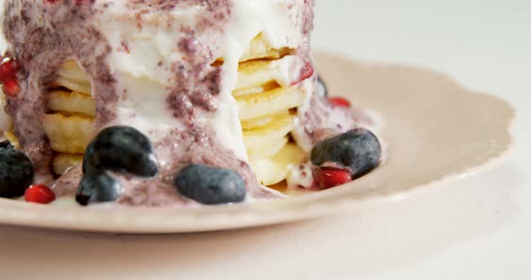 Waffle ice cream garnish with fruits placed on plate 4K 4k