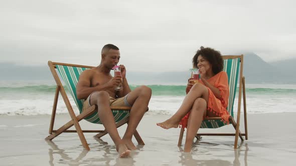 Couple enjoying free time by the sea