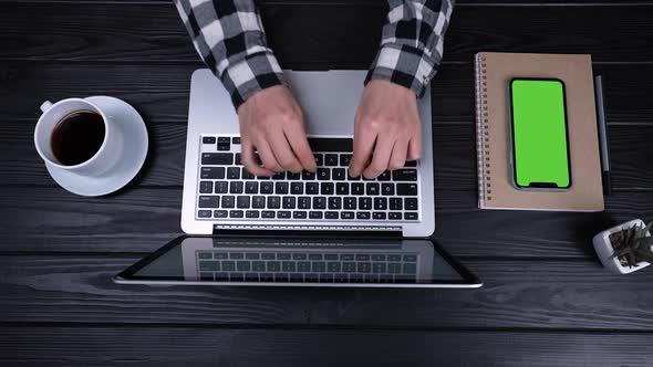 Top View of the Hands of a Girl Who Type Writes Emails on an Laptop